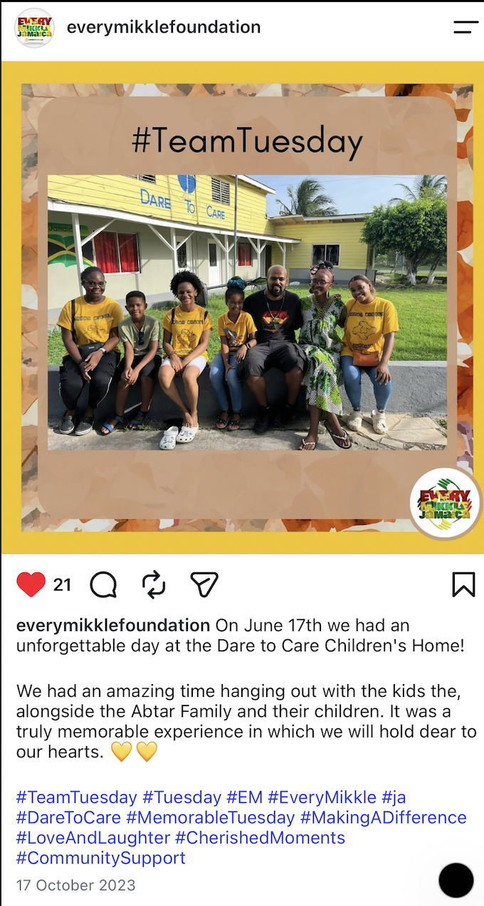 Every Mikkle Foundation volunteers and the Abtar family seated together outside the Dare to Care Children's Home